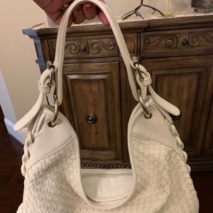 Cache white shoulder bag.